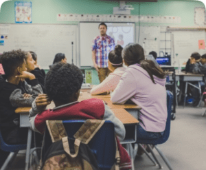 teaching talking to students in classroom